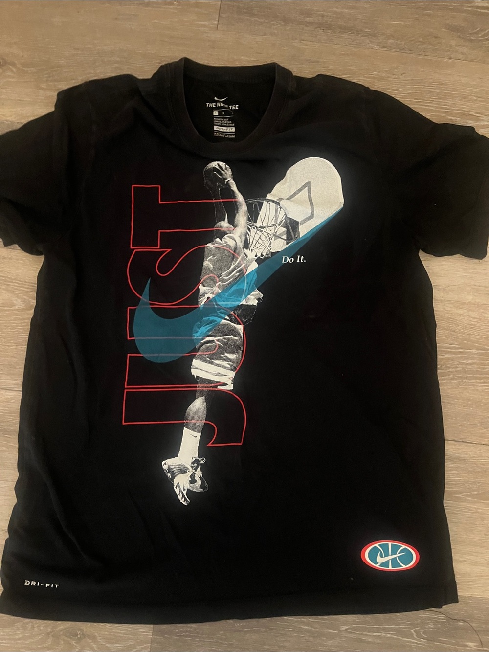 Nike Black Short Sleeve Basketball Graphic Tee with Blue Swoosh,